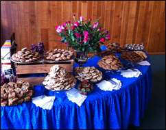 Dessert table in Chalice Room covered with cookies.